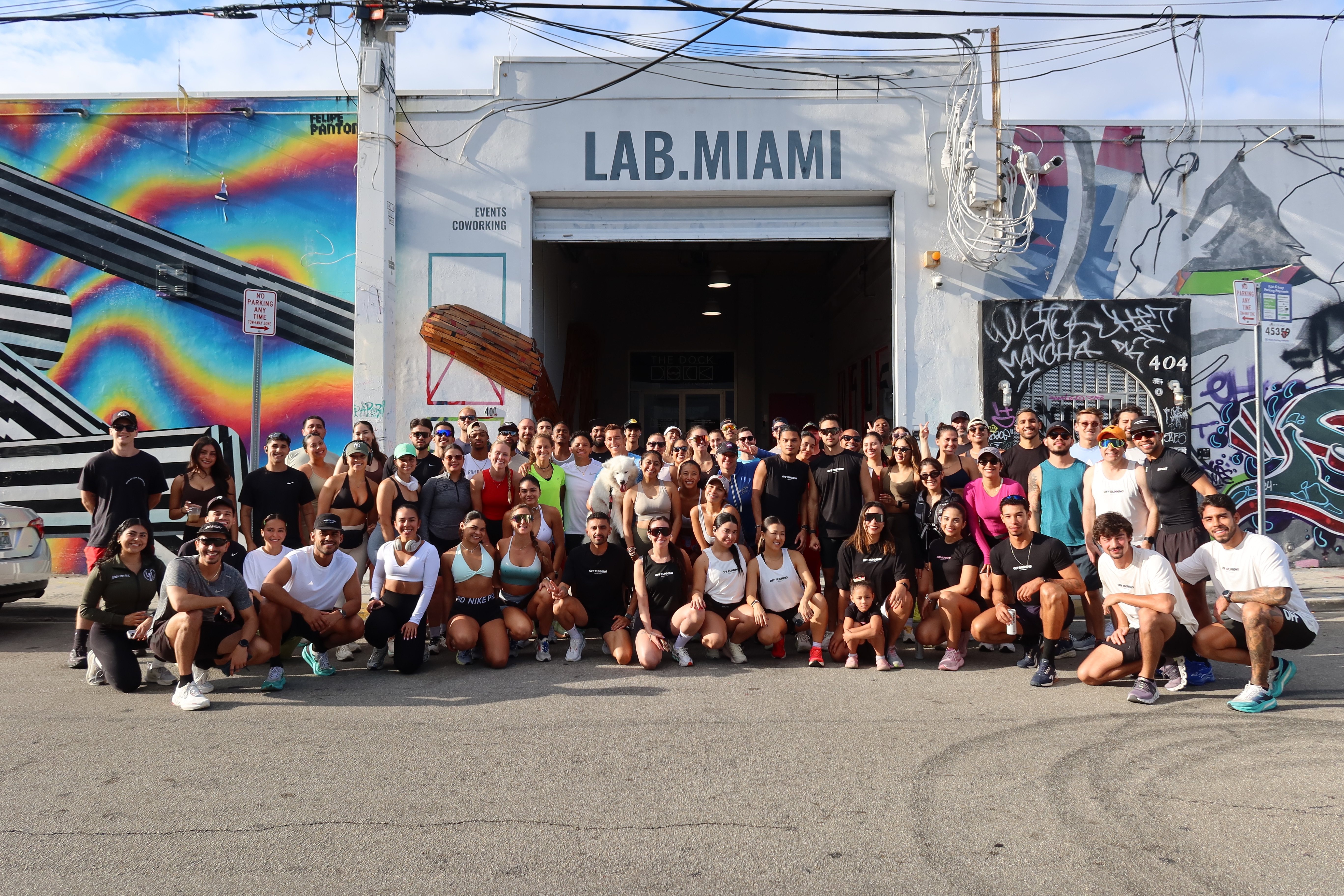 Large community fitness event outside LAB Miami building in Wynwood